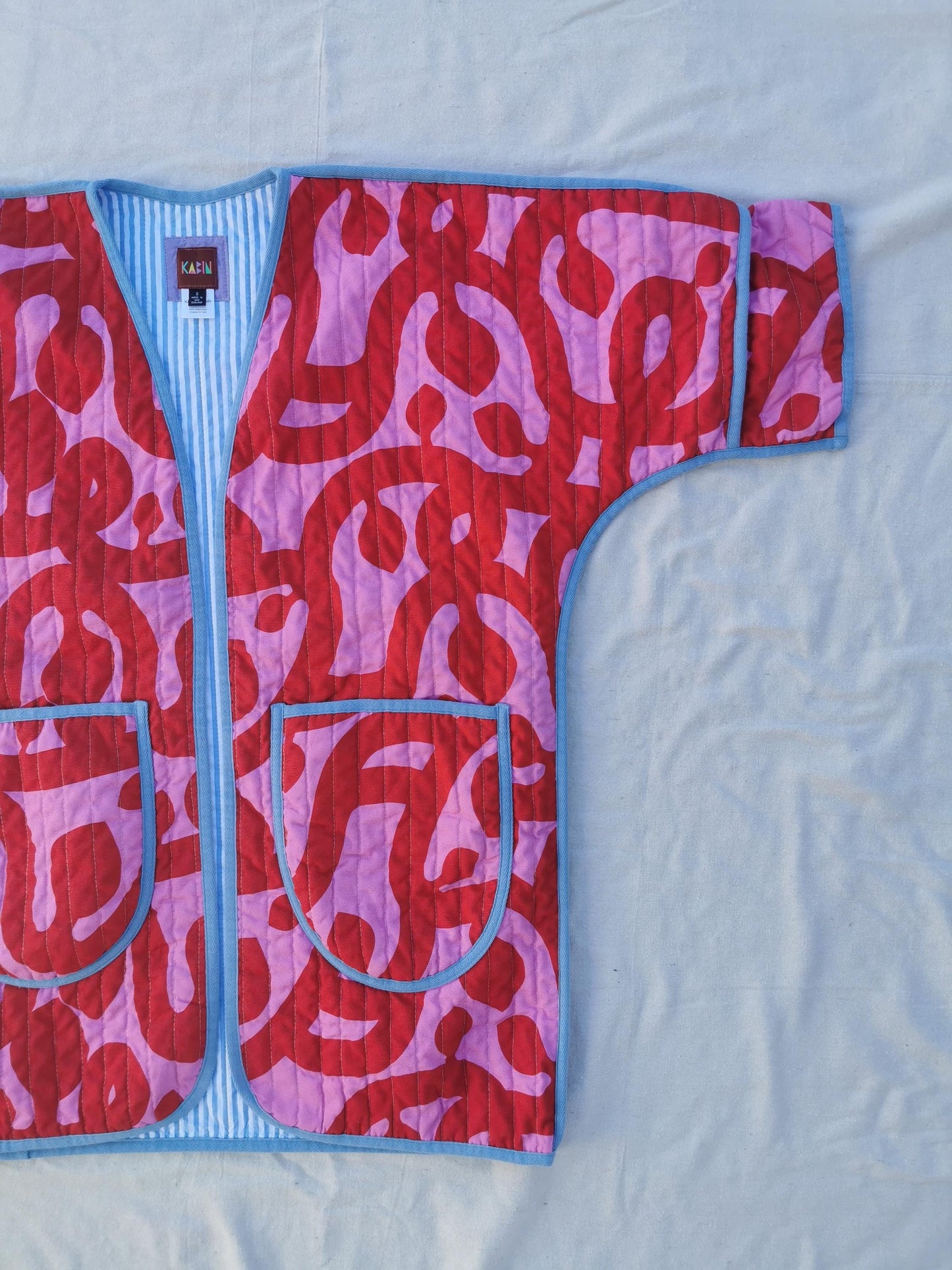 QUILT COAT - Size S - Bold Red and Pink Print with Striped Lining