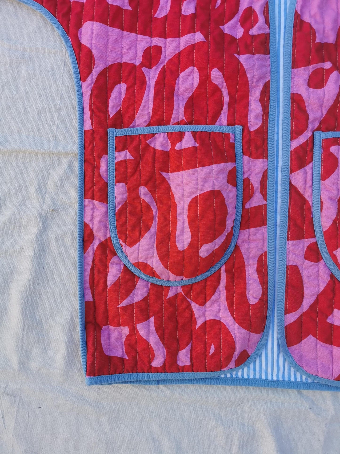 QUILT COAT - Size S - Bold Red and Pink Print with Striped Lining
