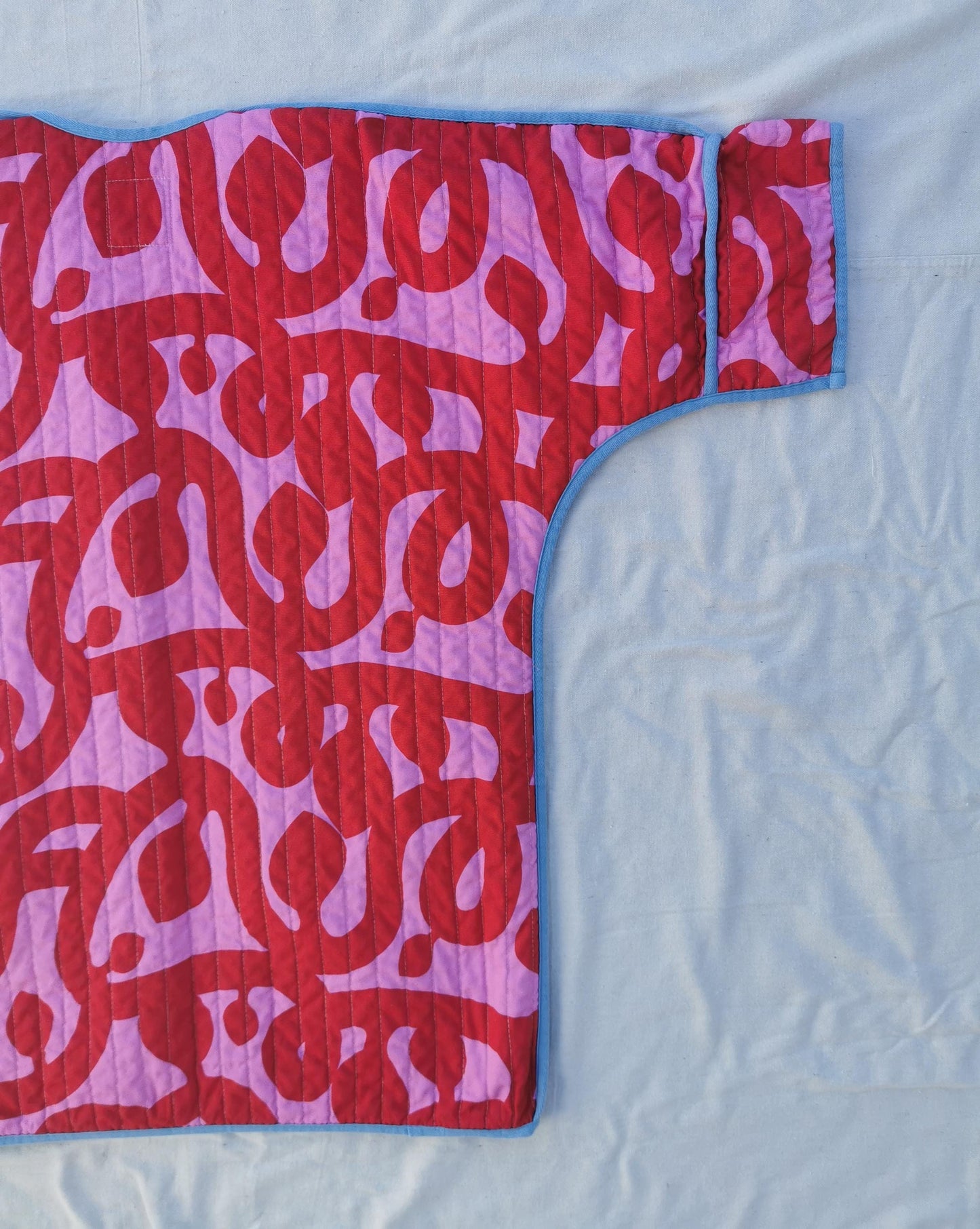 QUILT COAT - Size S - Bold Red and Pink Print with Striped Lining